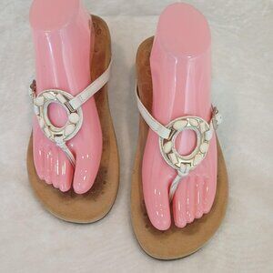 VIONICS THONGS WITH GOLD-TONE EMBELLISMENT